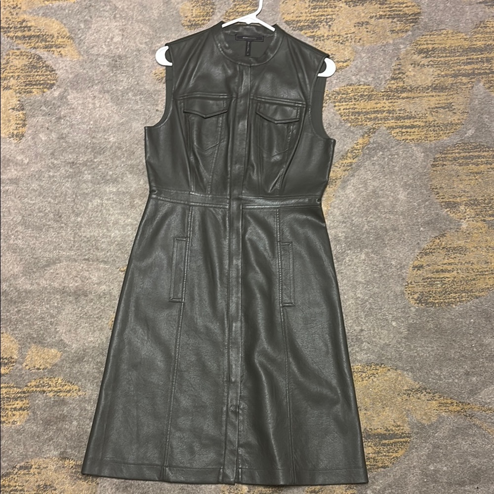 Sleeveless dark green Leather Dress in size M. Like new.